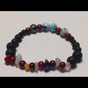 7 NATURAL CHAKRA STONES BRACELET WITH LAVA STONES